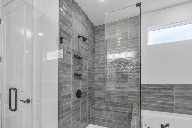 bathroom with independent shower and bath