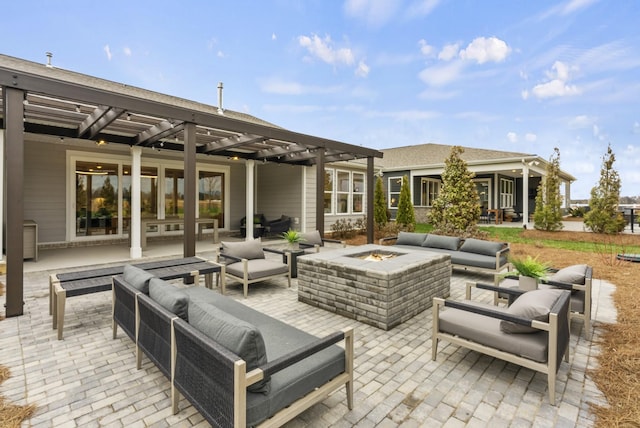 view of patio / terrace featuring a pergola and an outdoor living space with a fire pit