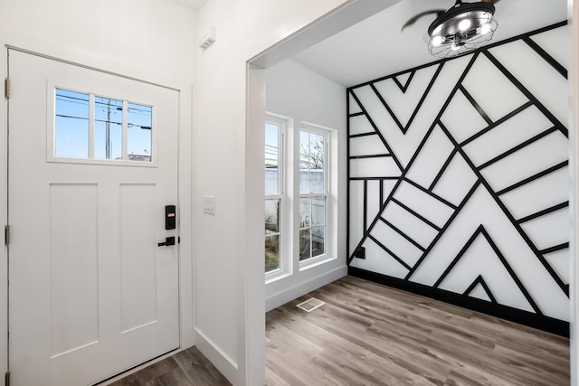 foyer with hardwood / wood-style floors