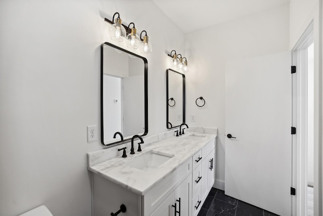 bathroom featuring tile patterned floors and vanity