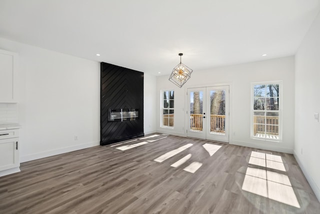 interior space with french doors and light wood-type flooring