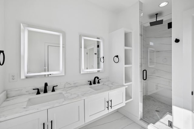 bathroom with vanity and an enclosed shower