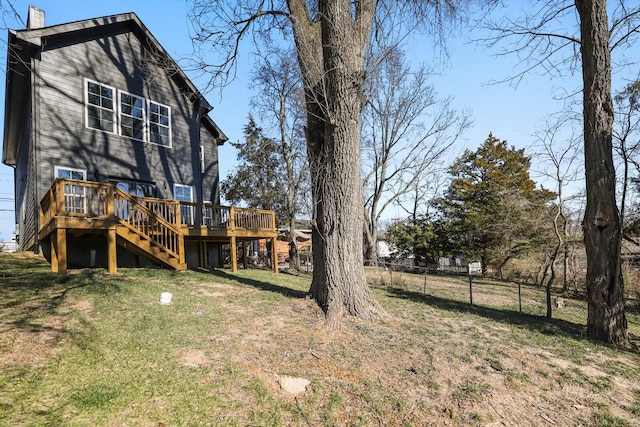 view of yard featuring a wooden deck