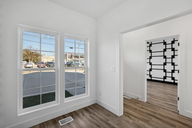 interior space with hardwood / wood-style flooring