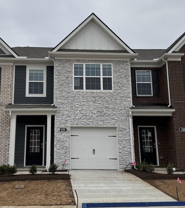 view of front of property with a garage