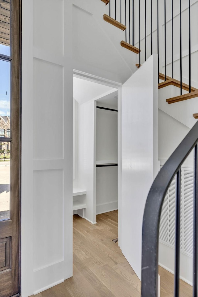 entryway with light hardwood / wood-style flooring