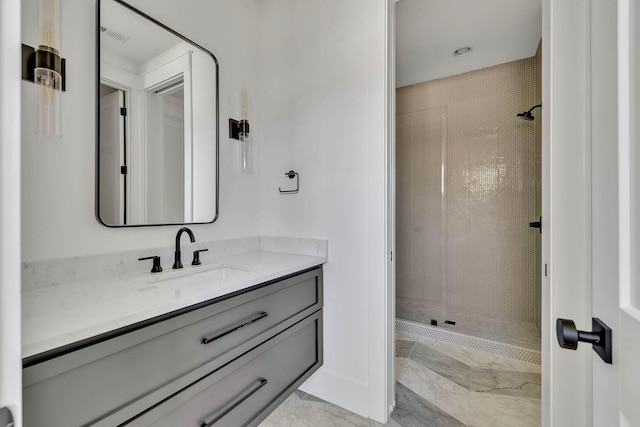 bathroom featuring vanity and walk in shower