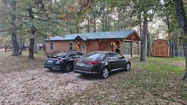 exterior space featuring a storage shed