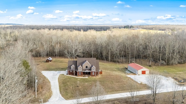 birds eye view of property featuring a rural view