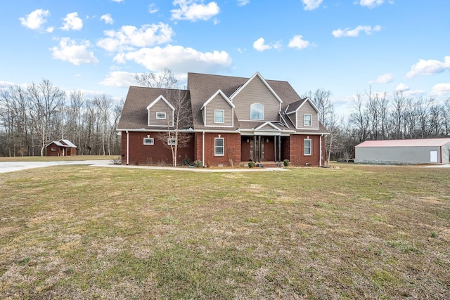 view of front of property with covered porch and a front lawn