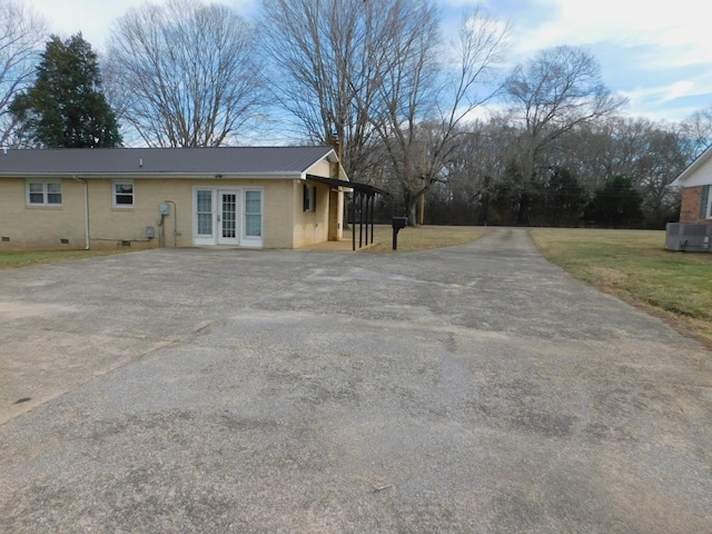 exterior space with central AC unit