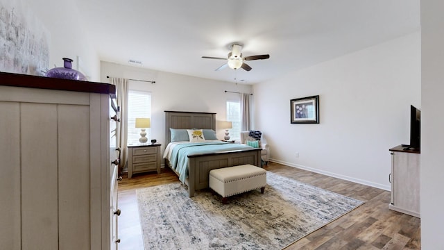 bedroom featuring ceiling fan and light hardwood / wood-style floors