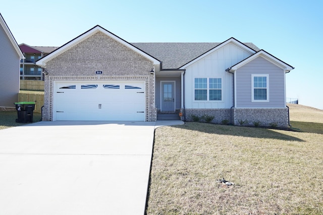 view of front facade with a garage and a front lawn