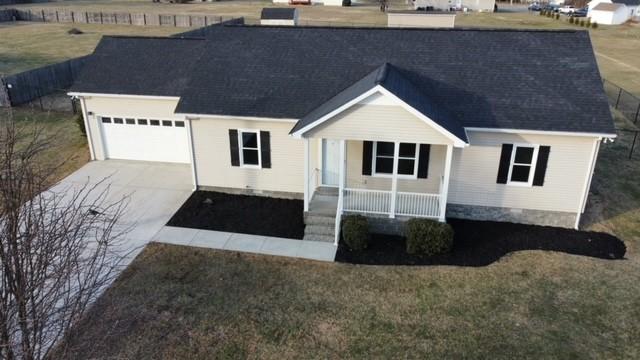 view of front of home with a garage and covered porch