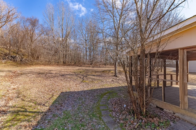 view of yard featuring a deck