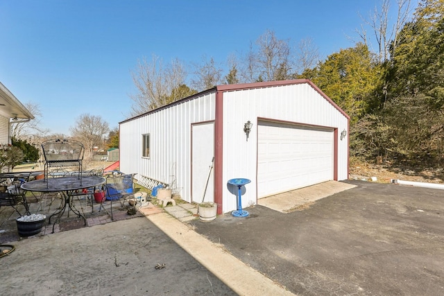 view of outbuilding featuring a garage