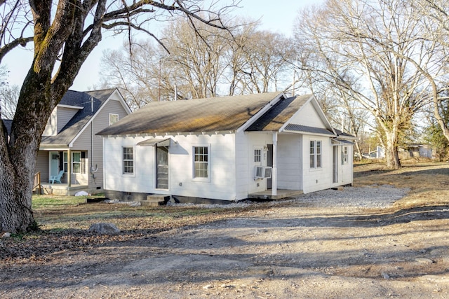 view of side of home with cooling unit