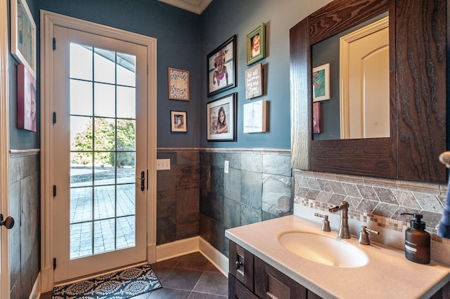 bathroom featuring tile patterned flooring and vanity