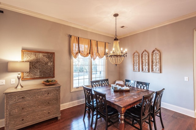 dining area with an inviting chandelier, ornamental molding, and dark hardwood / wood-style floors