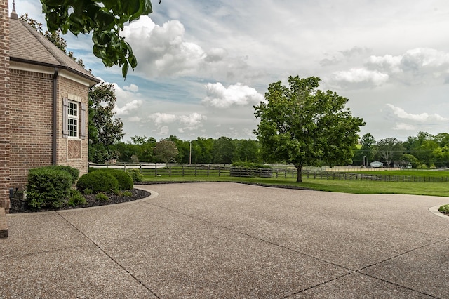 view of patio / terrace with a rural view