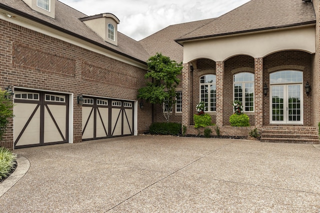 view of front of home with a garage