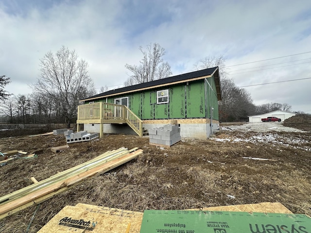 property under construction with a wooden deck