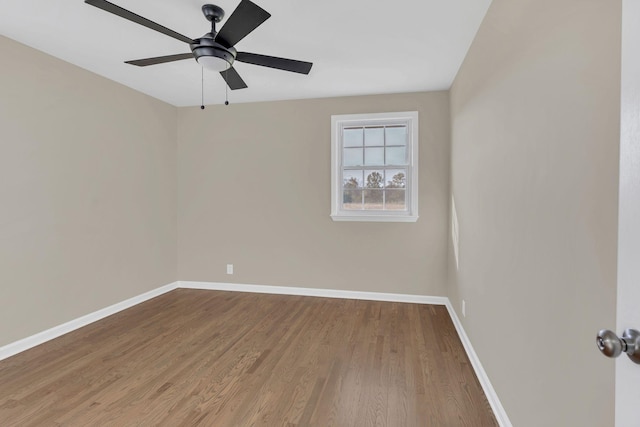 unfurnished room with wood-type flooring and ceiling fan