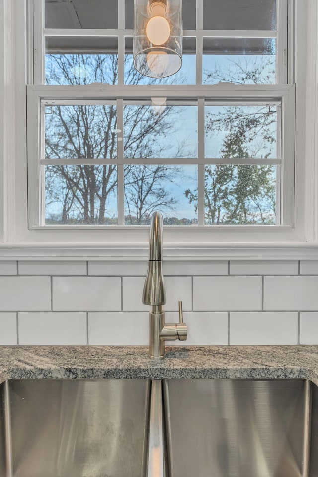 details with sink and light stone countertops