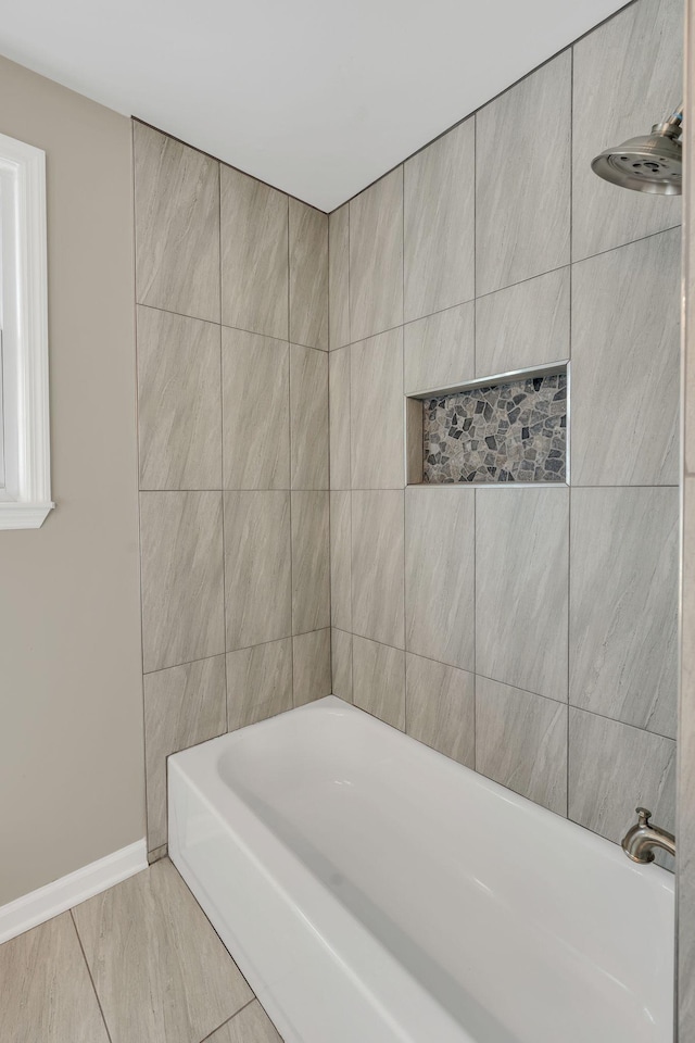 bathroom featuring a tub to relax in