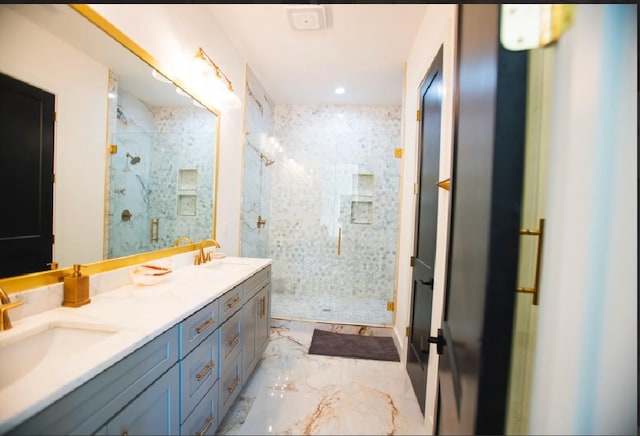 bathroom with vanity and walk in shower