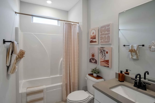 full bathroom with vanity, toilet, and shower / tub combo