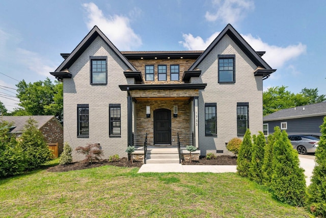 view of front of house with a front lawn