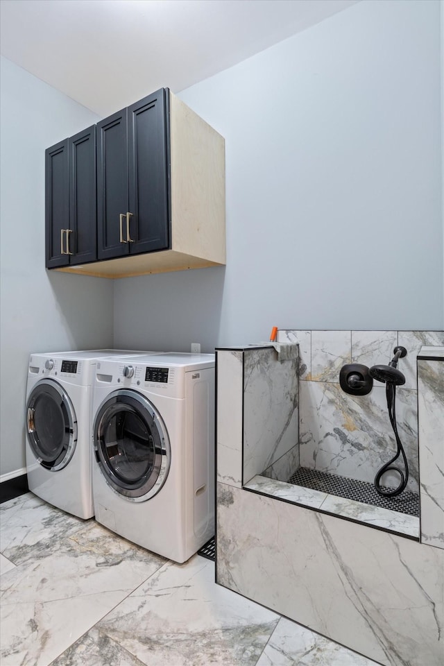 laundry area with cabinets