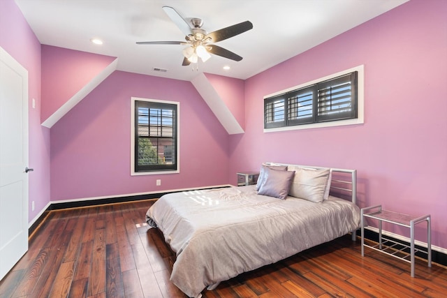 bedroom with ceiling fan and dark hardwood / wood-style flooring