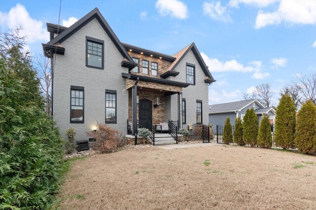 view of front facade with a front lawn