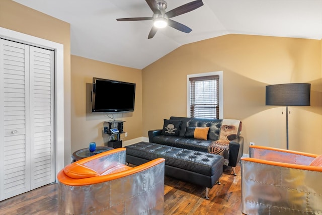 living room with lofted ceiling, hardwood / wood-style floors, and ceiling fan