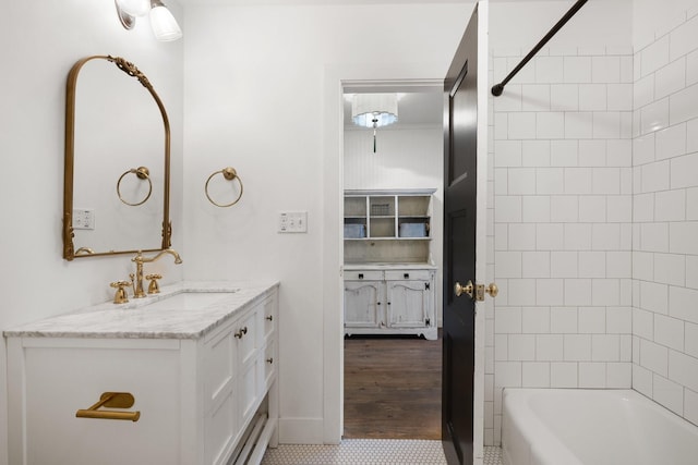 bathroom featuring vanity and shower / bathing tub combination