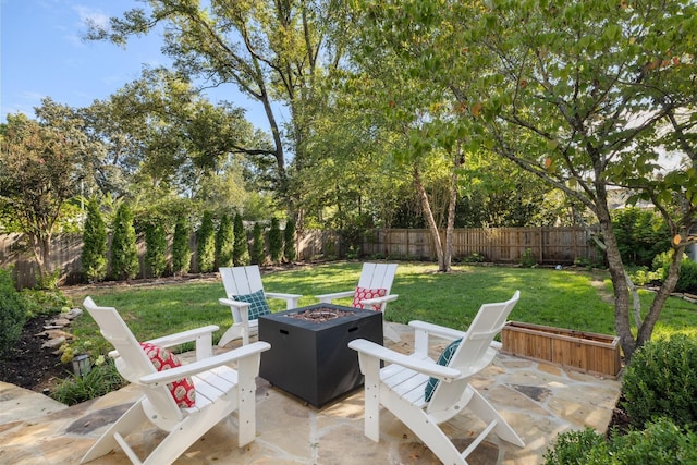 view of patio featuring an outdoor fire pit