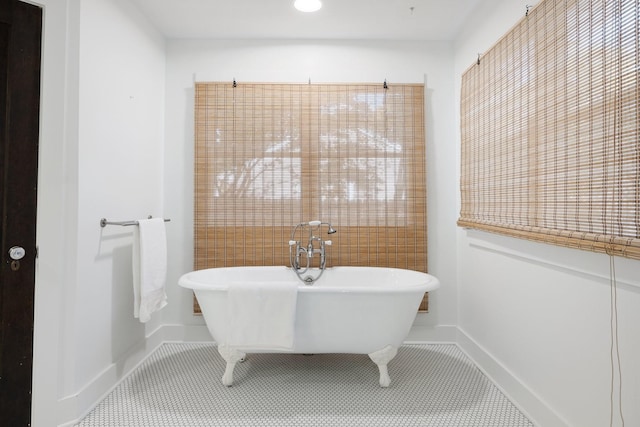 bathroom with a tub