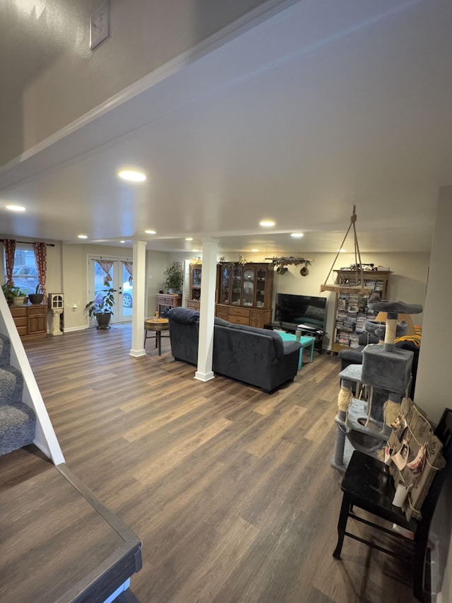 living room with french doors and wood-type flooring