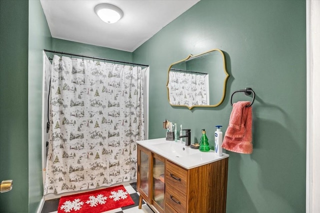 bathroom with vanity and a shower with shower curtain