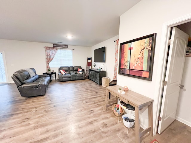 living room featuring light wood-type flooring