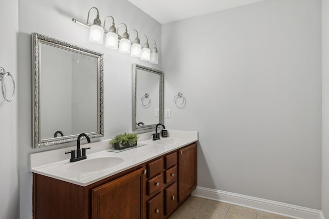 bathroom with vanity and tile patterned flooring