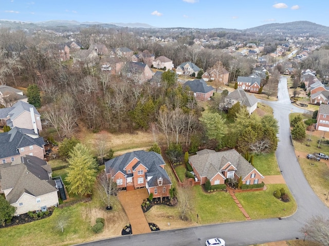 drone / aerial view featuring a mountain view