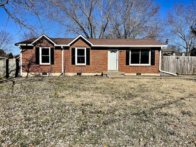 ranch-style house featuring a front lawn