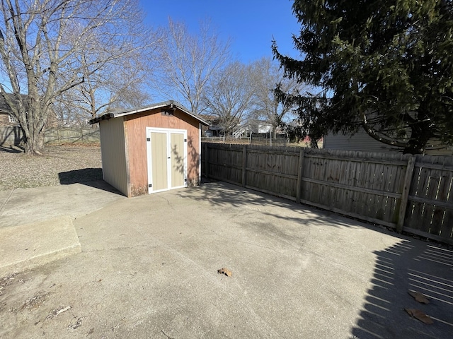 view of patio / terrace with a storage shed