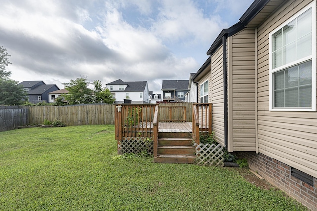 view of yard featuring a wooden deck