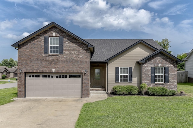 view of front facade with a garage and a front lawn