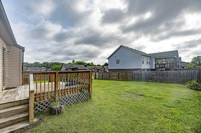 view of yard featuring a deck