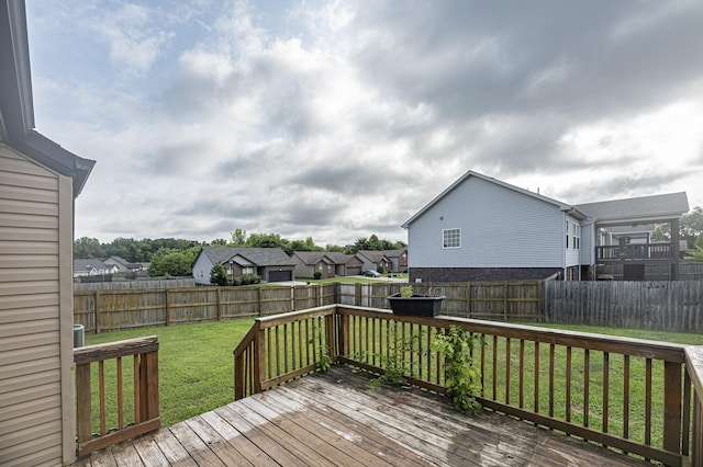 deck featuring a lawn